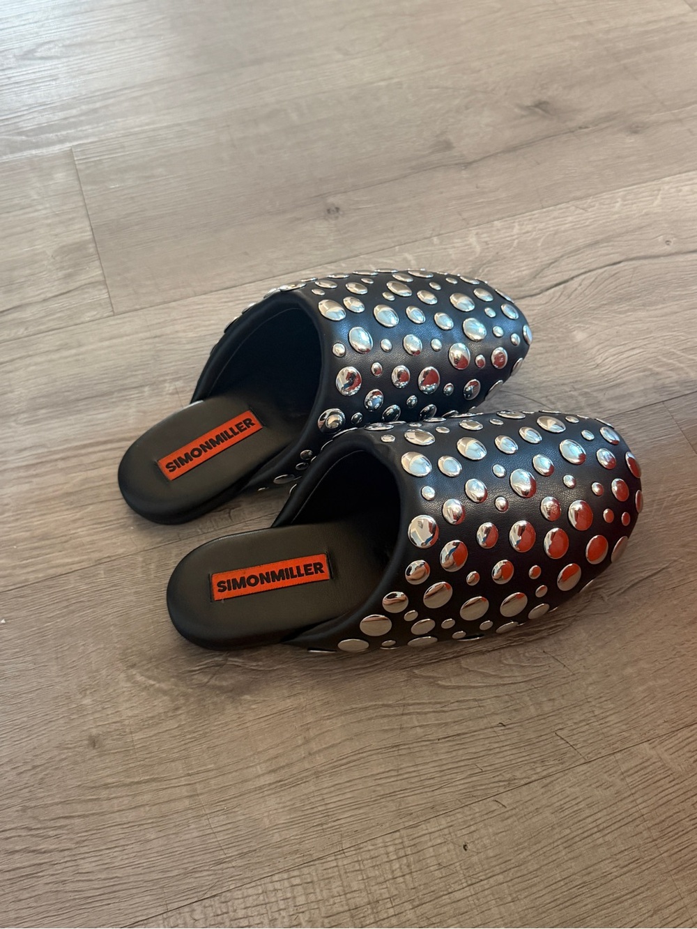 SIMONMILLER STUDDED BUBBLE SLIPPER IN BLACK/SILVER